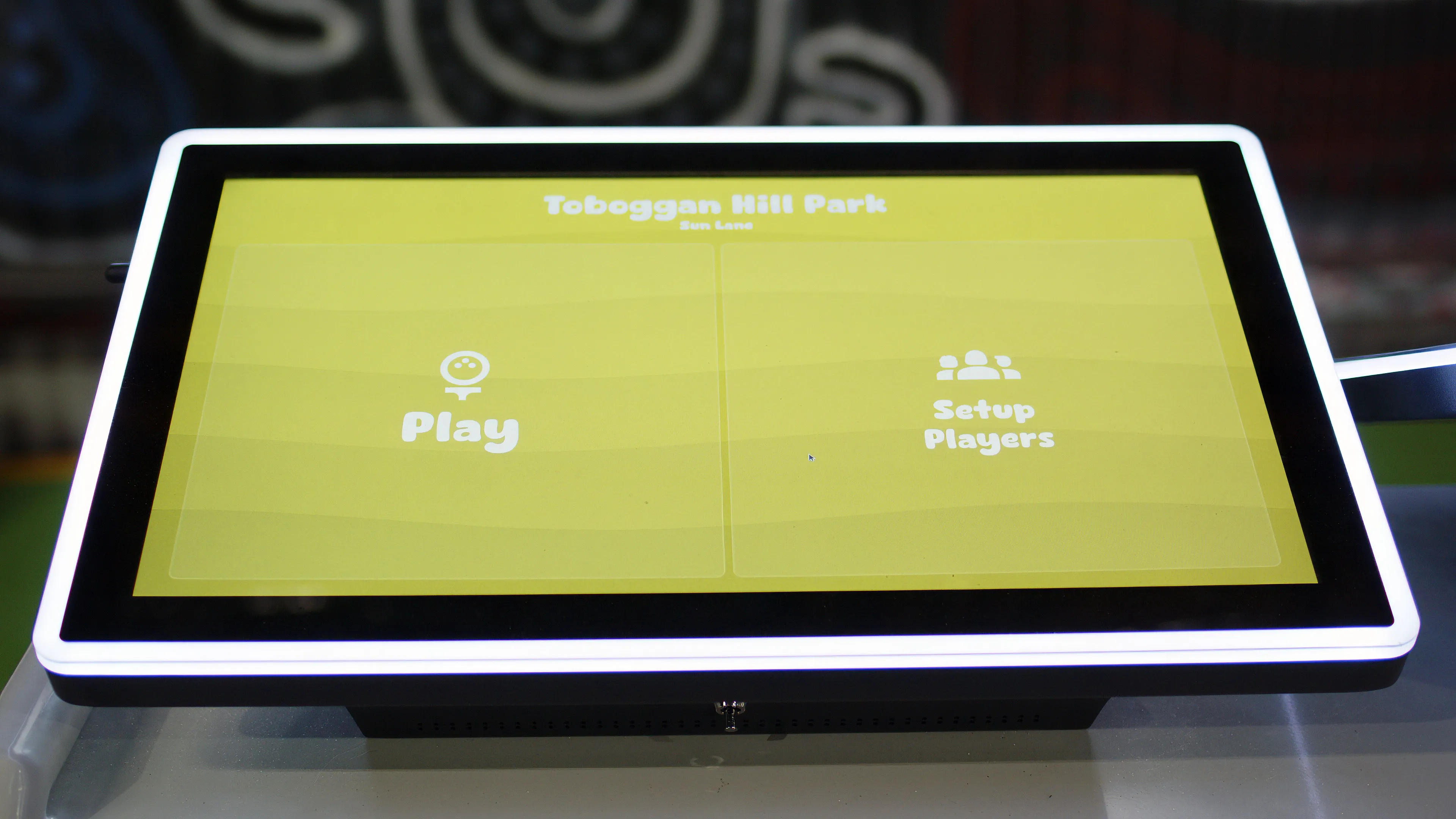 Close-up of LaneCraft's bowling software interface on a scoring screen