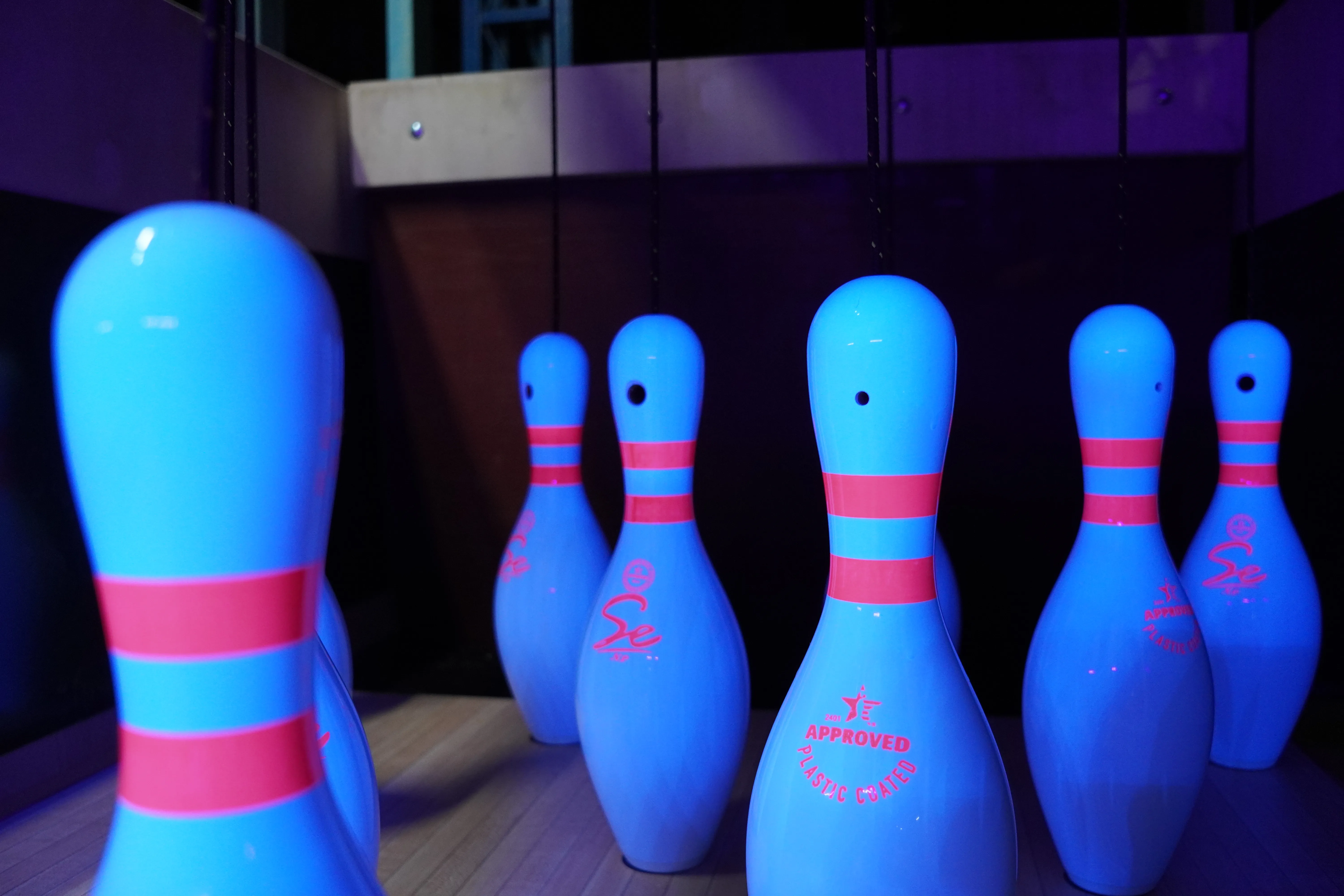 Bowling pins under UV lighting at Toboggan Hill Park